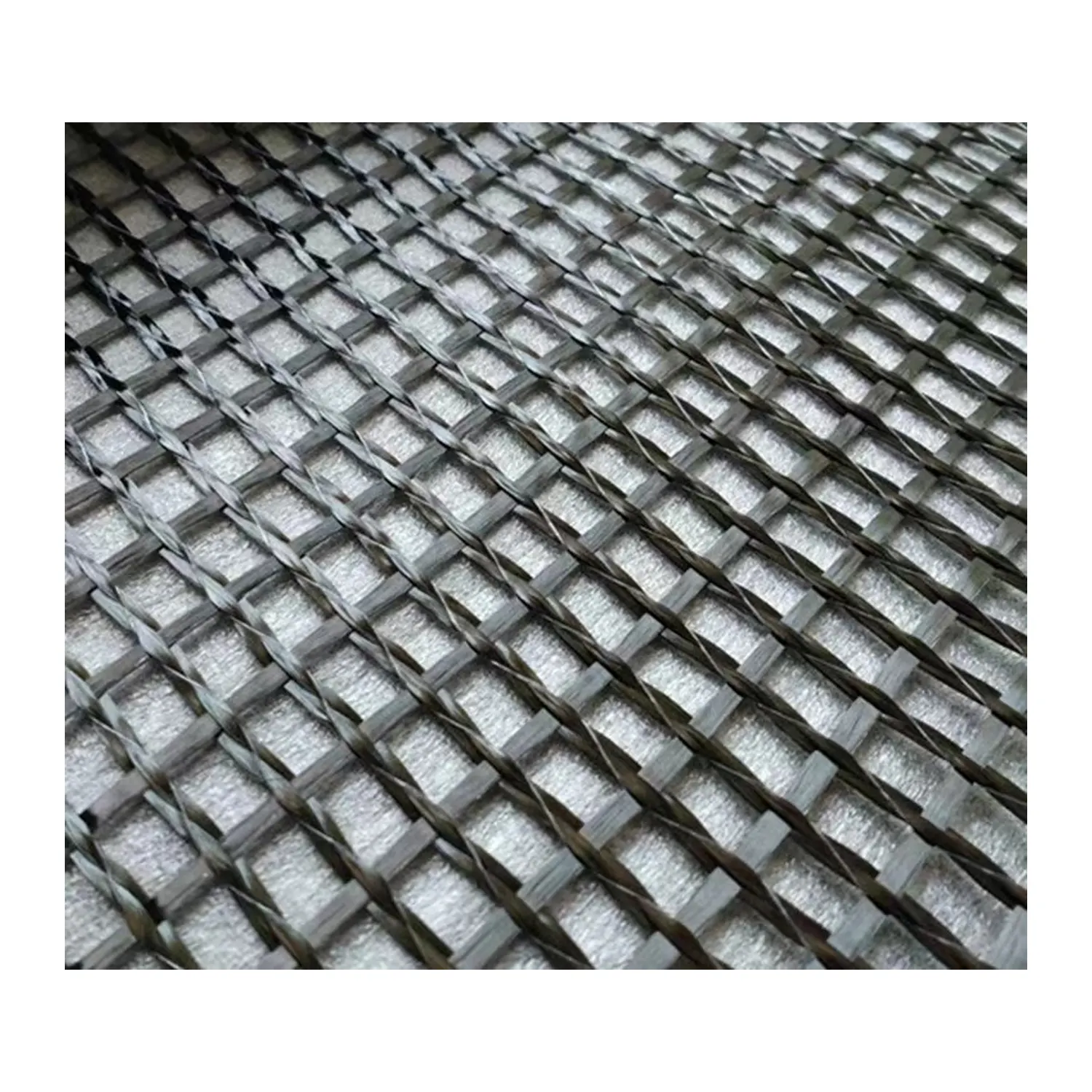 Ligne de production de géogrilles Fabrication de maillages en fibre pour chaussées en ciment renforcé