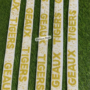 Bolso bandolera con cuentas de moda Correa Geaux Tigers Patrón Blanco y amarillo Ideal para boutiques y regalos - Product Image 1