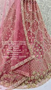 ชุด lehenga choli ตาข่ายสีชมพูกุหลาบที่สง่างามเสื้อปักลายดูปองตาสไตล์ดั้งเดิมสำหรับงานแต่งงานงานเฉลิมฉลอง