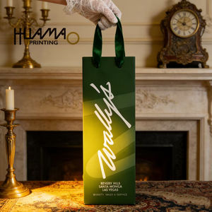 Sacs en papier pour vin vert de qualité supérieure Huamao avec poignées robustes, sacs de transport pour vin avec logo personnalisé pour la vente au détail, les cadeaux et les événements de dégustation de vin - Product Image 1