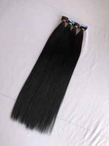 Precio al por mayor de exportación Cinta recta natural negra en 100% Extensión de cabello humano de templo indio de donante único de calidad superior natural - Product Image 3