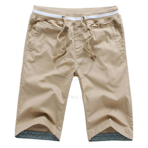 Pantalones cortos para hombre más vendidos, de secado rápido, transpirables, de cintura media, tela de lona, diseño de logotipo personalizable, estilo de calle hecho en Pakistán - Product Image 1