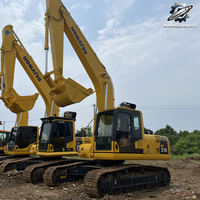 Excavatrice sur chenilles Komatsu PC210, 21 tonnes, excavatrice hydraulique moyenne, moteur SAA6D107, excavatrice de construction japonaise d'occasion
