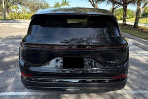 SUV Grand Touring d'occasion 2026 avec batterie au lithium, cuir foncé, transmission intégrale, double charge rapide électrique, jantes R18, toit ouvrant panoramique – Prêt à l'emploi - Product Image 4