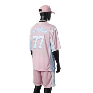 Ensemble short de basketball pour homme, polyester respirant de qualité supérieure, empiècements latéraux rose et bleu, logo personnalisé par transfert thermique. - Product Image 4