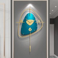 Jam Dinding Logam Emas Biru Unik Grosir dengan Mesin Quartz dan Tampilan Jarum Desain Modern untuk Dekorasi Rumah Ruang Tamu