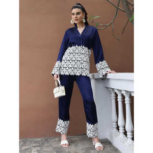 Orange éclatant pour un ensemble coordonné avec des inserts en dentelle élégante, pantalon à bordures contrastées, style affirmé et élégant en soie Dupian - Product Image 1