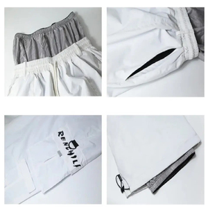 Pantalones de esquí unisex impermeables, ecológicos, holgados, de cintura alta, térmicos para invierno, para snowboard, con cintas reflectantes. - Product Image 4