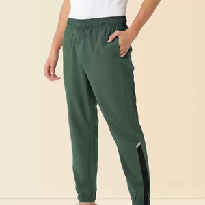 Pantalon de survêtement vert en polyester pour homme, taille élastique, poches latérales, décontracté, léger, idéal pour le printemps - Product Image 1