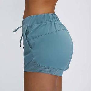 Pantalones cortos de calidad Premium para mujer, pantalones cortos de compresión de yoga para entrenamiento de cintura alta, hechos a medida, Pakistán, precio al por mayor, pantalones cortos para mujer - Product Image 5