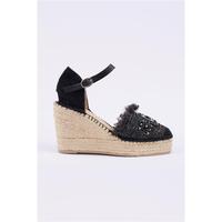 Espadrille fermée à talon compensé haut