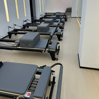 Reformer de Pilates Comercial de Aleación de Aluminio Ajustable con Muelles CE de Alta Resistencia y Telescópicos para Entrenamiento de Core Flexible para Mujeres