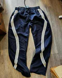 กางเกงวอร์มขายาวของผู้ชายกางเกงและกางเกงผ้าโพลีเอสเตอร์ผ้าสแปนเด็กซ์ปักโลโก้กางเกงโอเวอร์ไซส์ทรงหลวมมีลาย - Product Image 5