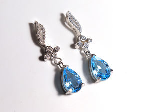 ต่างหูพลอยบลูโทแพซแท้จากสวิสเซอร์แลนด์ รูปทรงลูกแพร์ ขนาด 10x7 มม. ขัดเงาอย่างดี ของขวัญสำหรับเธอ - Product Image 4