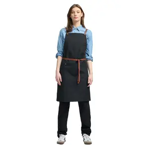 最新设计的女性黑色棉帆布耐用十字背调酒师围裙，配有可调节的皮带，用于销售厨师围裙