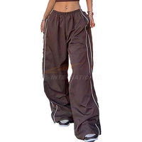 Baggy Fallschirm hose mit weitem Bein Damen 100% Polyester Streetwear Jogging hose mit verstellbarem Saum Seiten taschen Elastischer Bund