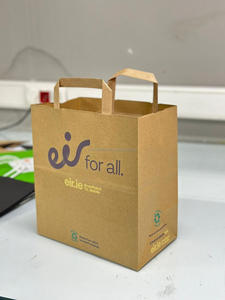 Vente en gros de sacs d'épicerie en papier kraft brun imprimé de logo personnalisé avec poignée plate pour l'emballage et l'emballage des aliments - Product Image 3