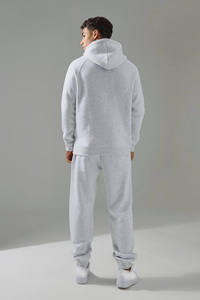 ชุดเซ็ตแทรคสูทโอเวอร์ไซส์แบบยูนิเซ็กซ์ สีบล็อกตัดต่อ พร้อมเสื้อสเวตเชิ้ตและกางเกงจ็อกเกอร์ สกรีนโลโก้ได้ตามต้องการ แฟชั่นสตรีทแวร์ ผลิตโดย Marfa International - Product Image 3