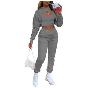 Conjunto Deportivo de Tres Piezas para Mujer, Leggings Sin Costuras, Sujetador Deportivo y Top Corto de Manga Larga - Product Image 1