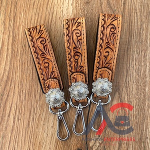พวงกุญแจหนังแท้แบบคลิปหนีบสายรัดข้อมือลายดอกไม้ตะวันตกพวงกุญแจหนังแท้ - Product Image 1