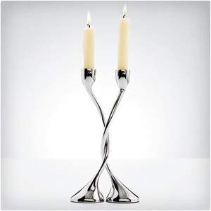 Elegant metal <b>candle</b> holder with scroll work and <b>sconce</b> design created for soft lighting and decorative ambiance - Product Image 1