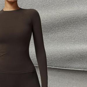 Tela elástica térmica 88% POLY 12% SPANDEX 170gm2 Jersey individual con cepillo Ropa deportiva Transpirable Elástico para niños - Product Image 1