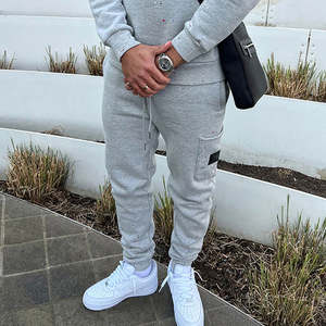 กางเกงวิ่งขากระบอกของผู้ชาย,กางเกงวอร์มทรงหลวมมีกระเป๋าลายสตรีท - Product Image 6