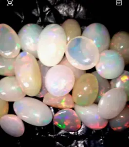 Proveedor de venta al por mayor, cabujón suelto liso, gemas de ópalo etíope, joyería de piedra de forma ovalada con tamaño de 25-30mm