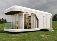 Conteneur en acier imperméable de maison de capsule préfabriquée minimaliste moderne pour le logement d'hôtel ou l'usage comme péniche élégante