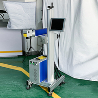 Machine de marquage laser UV pour le marquage en vol sur plastique, verre, bouteilles PET, code de date, impression en ligne haute vitesse