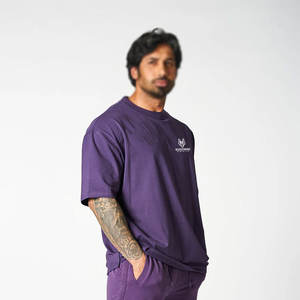 T-shirt à épaules tombantes de couleur unie 100% coton Style de rue imprimé audacieux pour hommes/femmes - Product Image 3