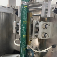Machine d'emballage multifonctionnelle pour sachets triangulaires de granulés, idéale pour l'emballage de chocolats, de fèves et de noix