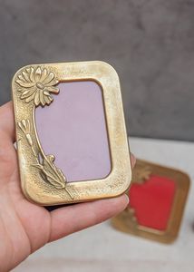 Bold metal <b>photo</b> <b>frame</b> designed for statement decor creating focus points on walls and shelves in homes - Product Image 2