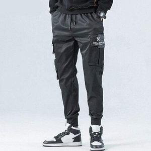 กางเกงเทคแวร์สีดำ รุ่นนินจา ปี 2025 กางเกงเทคแวร์แบบมีซิปและกระเป๋าแบบผ้าพันแผล กางเกงคาร์โก้ทรงจ็อกเกอร์ กางเกงสตรีทแวร์ฮิปฮอปสีดำสำหรับผู้ชายแบบสั่งทำพิเศษ - Product Image 4