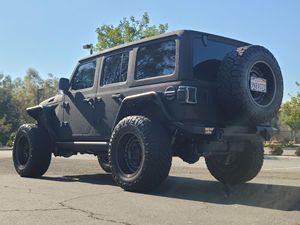 JEEP WRANGLER SP0RT S 4X4 2023 D'OCCASION CÔTÉ GAUCHE/CÔTÉ DROIT - Product Image 3