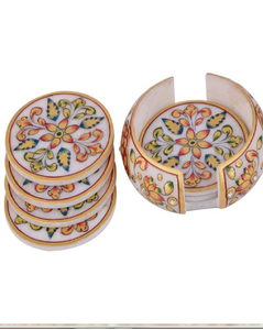 Posavasos de mármol blanco altamente decorados y un soporte redondo con coloridos e intrincados patrones florales pintados a mano y detalles dorados - Product Image 1