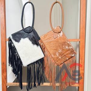 2025 lujo piel de vaca cuero flecos brazalete embrague nuevo diseñador bolso Sling Bag pelo en piel oculta bolso multiuso de mujer - Product Image 1