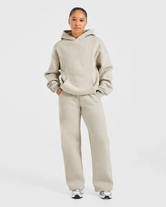 Derniers pantalons de jogging 100% coton pour femmes avec logo personnalisé pour femmes avec jambe droite et tissu polaire doux au toucher pour l'hiver - Product Image 4