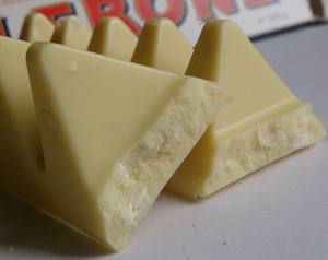 ไวท์มิลค์ช็อกโกแลตแท่งผสมถั่วแบบก้อน น้ำหนัก 100 กรัม ต่อแท่ง - Product Image 5