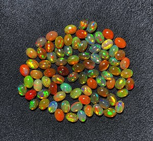 โอปอลสีส้มเอธิโอเปียอัญมณีอัญมณีทรงไข่หลวม19ชิ้น5*7มม. 10 CT ได้รับการรับรองจากธรรมชาติสำหรับการทำเครื่องประดับ - Product Image 5