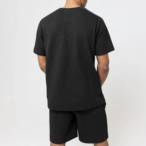 Conjunto de ropa informal para hombre Pantalones cortos de algodón de secado rápido y camiseta de manga corta Chándal sólido LOGOTIPO personalizado 2 piezas Colección de marca - Product Image 4