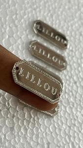 Custom made metal tag <b>engraved</b> with care for bags and clothing symbol of style strength and timeless beauty made to last forever - Product Image 4