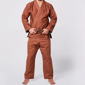 Mejor precio peso ligero hombres y mujeres BJJ GI uniforme 2025 uniformes de artes marciales con logotipos personalizados Top en venta - Product Image 1