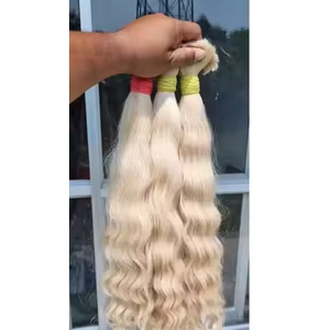 Extensiones de trama de cabello rubio Premium con cabello indio suave y sedoso que se obtiene directamente de los templos en la India - Product Image 1
