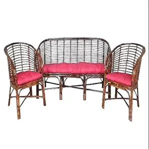 Canne artisanale magnifiquement conçue rose rembourré 3 sitter + 2 pas de chaise simple canne canapé ensemble pour la maison salon Resort canapé