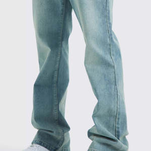 กางเกงยีนส์ทรงขาบานแบบมีแพทช์เวิร์คสำหรับผู้ชาย ทรงหลวม ไซส์ใหญ่ ผ้ายีนส์ฟอก - Product Image 5