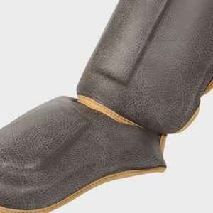 Protège-tibias Muay Thai Protège-tibias de boxe en cuir avec coutures renforcées et rembourrage haute densité Protection contre les chocs - Product Image 3