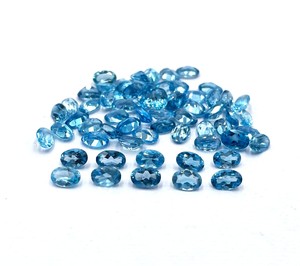 พลอยเทียมทรงไข่สวิสสีฟ้าขนาด5x7มม. สำหรับทำเครื่องประดับหินบุษราคัม - Product Image 1