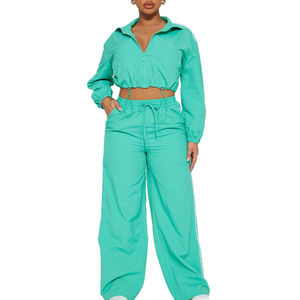 Ensemble survêtement imperméable pour femme en 2 pièces, veste coupe-vent zippée et pantalon, ensemble coupe-vent personnalisable - Product Image 1