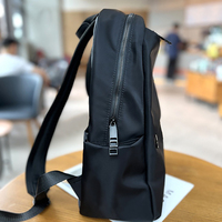 Sac à dos scolaire et de voyage unisexe en nylon noir, grande capacité, imperméable, fermeture éclair, style minimaliste, décontracté, pour usage quotidien
